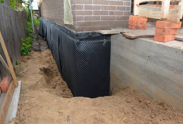 Happy homeowners after waterproofing job in Oak Harbor